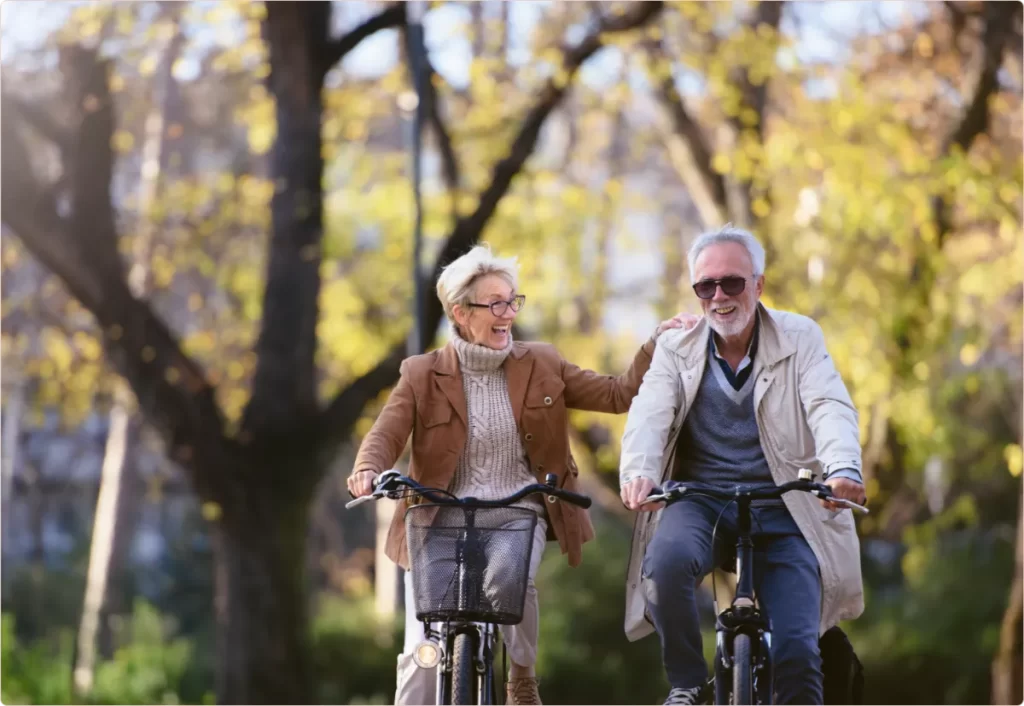 Elderly couple cycling