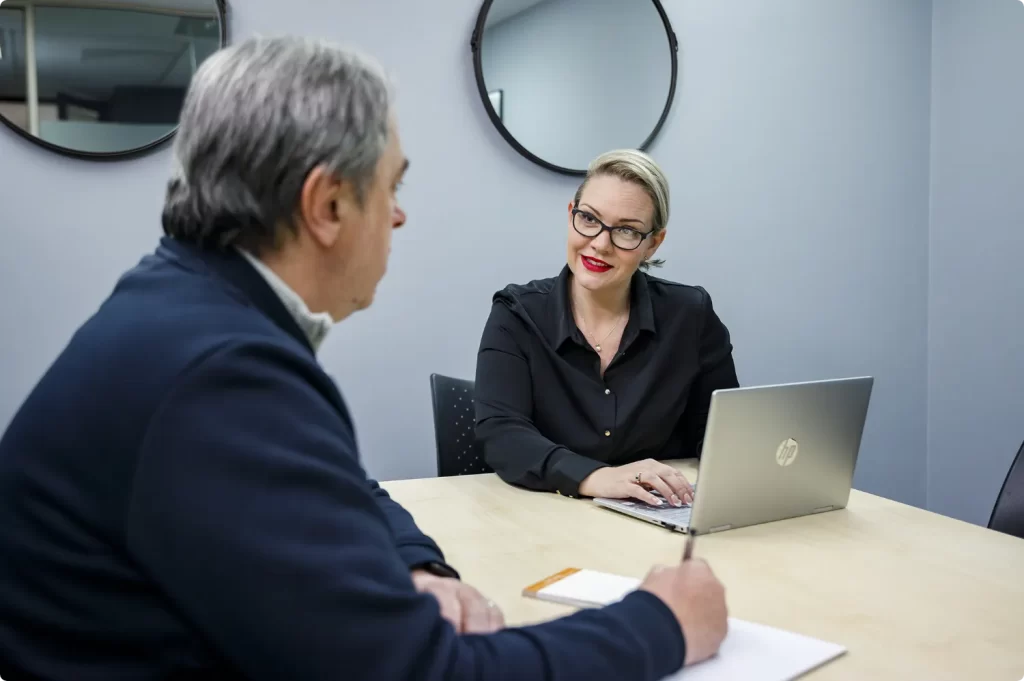 Lindsay having a meeting with a client